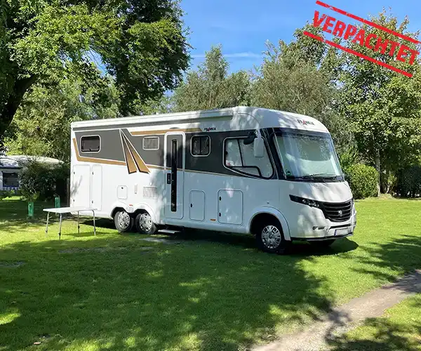 Wohnmobil auf einem Campingplatz- verpachtet durch die Firma CampConsult
